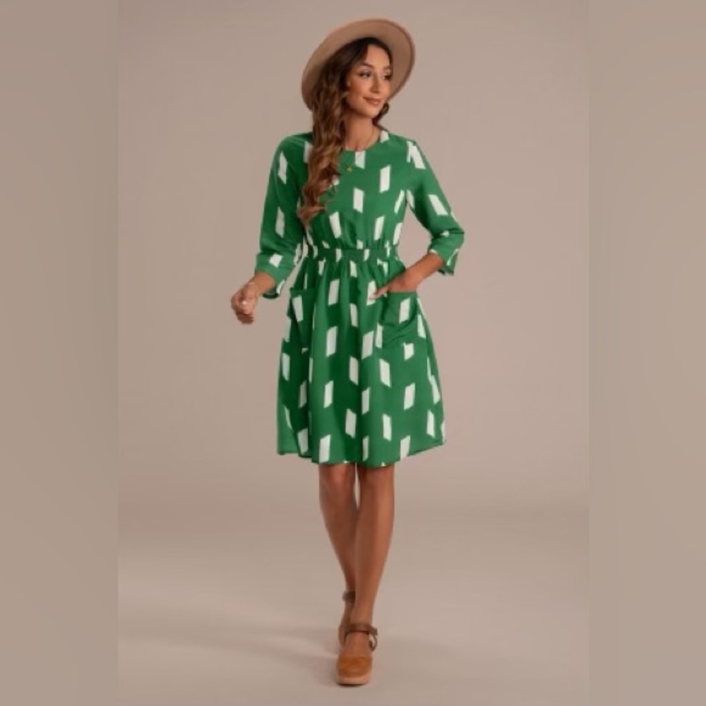 Bohemian and Geometric, 3/4 sleeve round neckline rayon midi dress with pockets